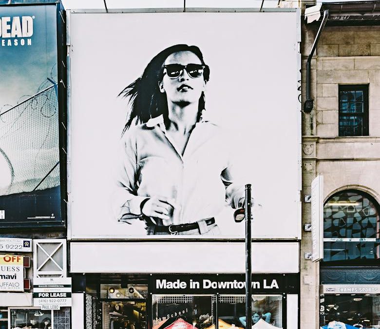 photo of billboard of woman in black and white